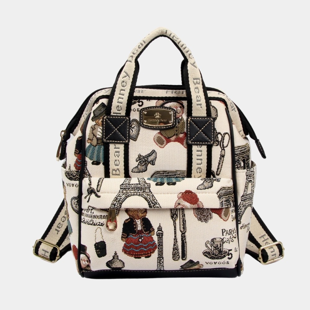 tapestry design of adorable bears, this designer compact backpack is good for day trips.