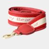 henney bear short shoulder strap in red colour.