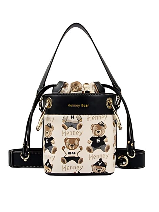 tapestry fabric black colour hand bag with off white and black colour bear pattern. it has drawstring closure top.